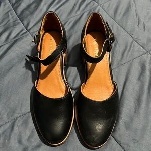 Black leather Mary Jane shoes made by Patina